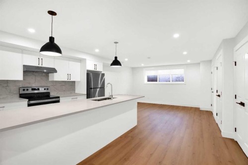 2516 16A Street Se, Calgary, AB - Indoor Photo Showing Kitchen With Double Sink With Upgraded Kitchen