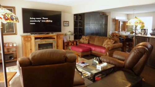 3828 Eastwood Crescent, Red Deer, AB - Indoor Photo Showing Living Room With Fireplace