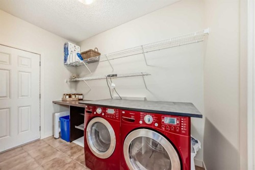 367 Hidden Creek Boulevard Nw, Calgary, AB - Indoor Photo Showing Laundry Room