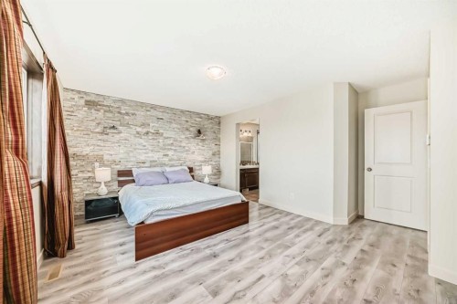 367 Hidden Creek Boulevard Nw, Calgary, AB - Indoor Photo Showing Bedroom