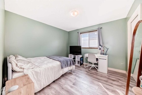 367 Hidden Creek Boulevard Nw, Calgary, AB - Indoor Photo Showing Bedroom