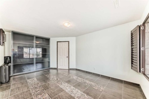 367 Hidden Creek Boulevard Nw, Calgary, AB - Indoor Photo Showing Other Room
