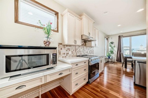 367 Hidden Creek Boulevard Nw, Calgary, AB - Indoor Photo Showing Kitchen With Upgraded Kitchen