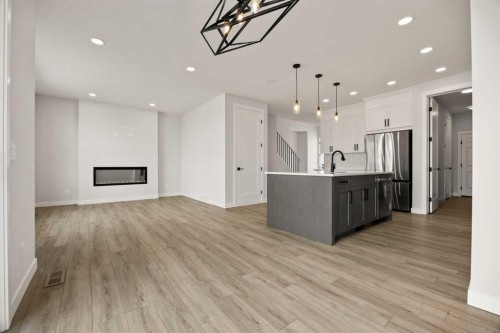 494 Kinniburgh Loop, Chestermere, AB - Indoor Photo Showing Kitchen With Upgraded Kitchen