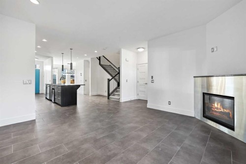 2013 24A Street Sw, Calgary, AB - Indoor Photo Showing Living Room With Fireplace