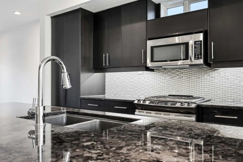 2013 24A Street Sw, Calgary, AB - Indoor Photo Showing Kitchen With Stainless Steel Kitchen With Double Sink With Upgraded Kitchen