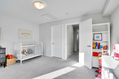 128 Cranbrook Square Se, Calgary, AB - Indoor Photo Showing Bedroom