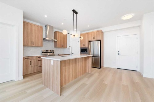 7211-1802 Mahogany Boulevard Se, Calgary, AB - Indoor Photo Showing Kitchen