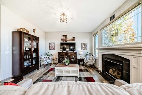 1516 Montrose Terrace Se, High River, AB - Indoor Photo Showing Living Room With Fireplace