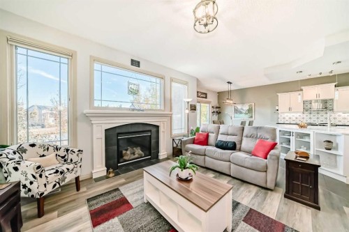 1516 Montrose Terrace Se, High River, AB - Indoor Photo Showing Living Room With Fireplace
