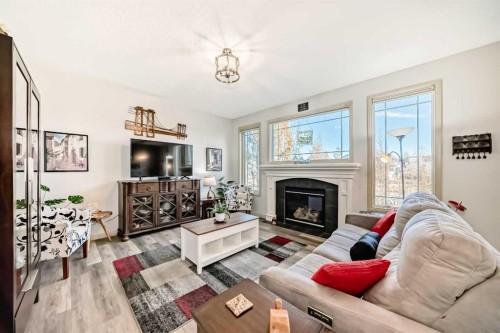 1516 Montrose Terrace Se, High River, AB - Indoor Photo Showing Living Room With Fireplace