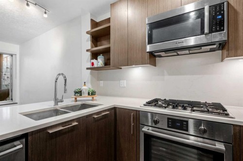 202-88 9 Street Ne, Calgary, AB - Indoor Photo Showing Kitchen With Stainless Steel Kitchen With Double Sink With Upgraded Kitchen