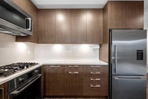 202-88 9 Street Ne, Calgary, AB - Indoor Photo Showing Kitchen With Stainless Steel Kitchen With Upgraded Kitchen