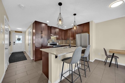 128 Country Village Manor Ne, Calgary, AB - Indoor Photo Showing Kitchen With Stainless Steel Kitchen With Upgraded Kitchen