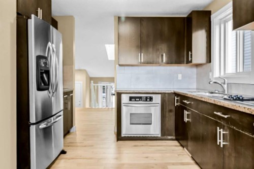 16279 10 Street Sw, Calgary, AB - Indoor Photo Showing Kitchen