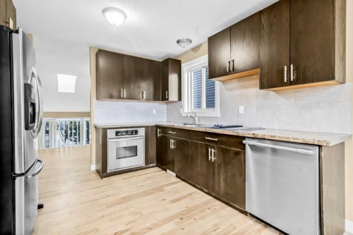 16279 10 Street Sw, Calgary, AB - Indoor Photo Showing Kitchen With Stainless Steel Kitchen