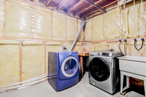 16279 10 Street Sw, Calgary, AB - Indoor Photo Showing Laundry Room