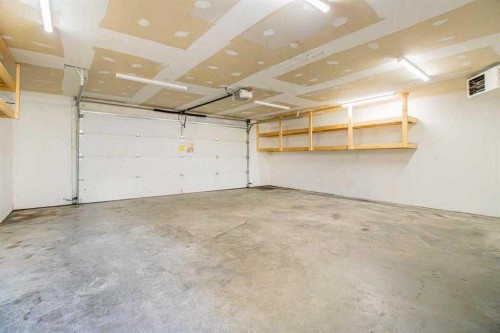 16279 10 Street Sw, Calgary, AB - Indoor Photo Showing Garage