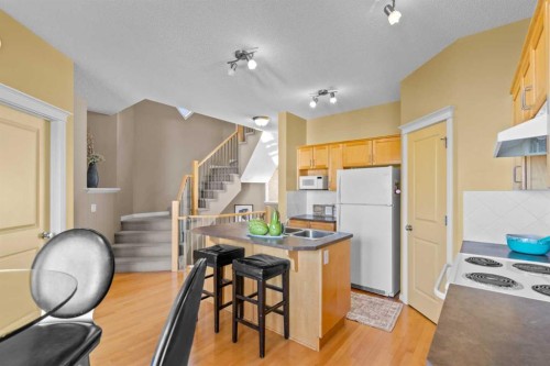 147 Hampstead Green Nw, Calgary, AB - Indoor Photo Showing Kitchen With Double Sink