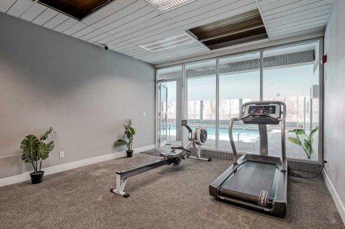 307-4944 Dalton Drive Nw, Calgary, AB - Indoor Photo Showing Gym Room