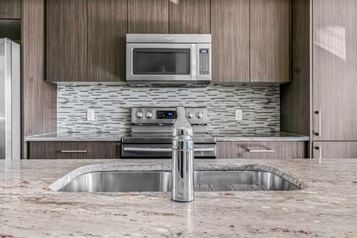 5105-333 Taralake Way Ne, Calgary, AB - Indoor Photo Showing Kitchen With Double Sink With Upgraded Kitchen