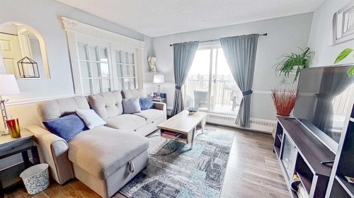 406-11 Dover Point Se, Calgary, AB - Indoor Photo Showing Living Room