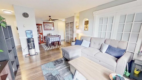 406-11 Dover Point Se, Calgary, AB - Indoor Photo Showing Living Room