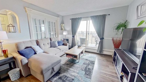 406-11 Dover Point Se, Calgary, AB - Indoor Photo Showing Living Room