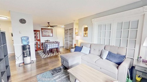 406-11 Dover Point Se, Calgary, AB - Indoor Photo Showing Living Room