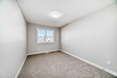 144 Belvedere Park Se, Calgary, AB - Indoor Photo Showing Other Room