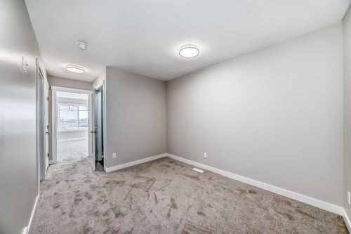 144 Belvedere Park Se, Calgary, AB - Indoor Photo Showing Other Room