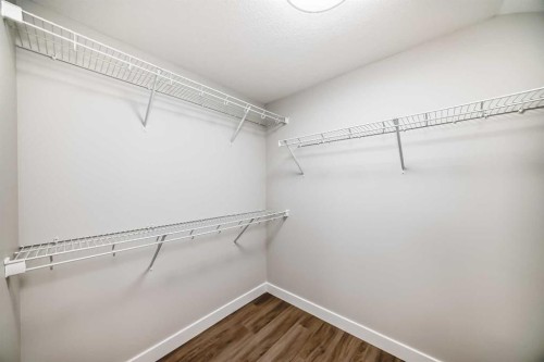 144 Belvedere Park Se, Calgary, AB - Indoor With Storage