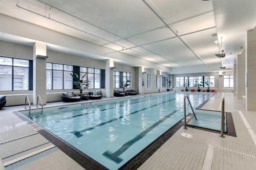 415-11 Mahogany Circle Se, Calgary, AB - Indoor Photo Showing Other Room With In Ground Pool