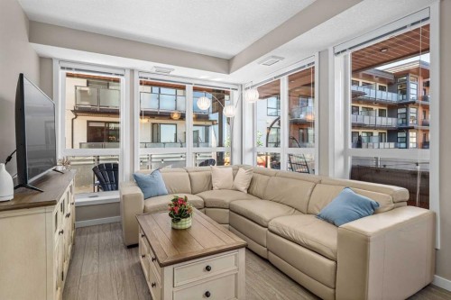 415-11 Mahogany Circle Se, Calgary, AB - Indoor Photo Showing Living Room