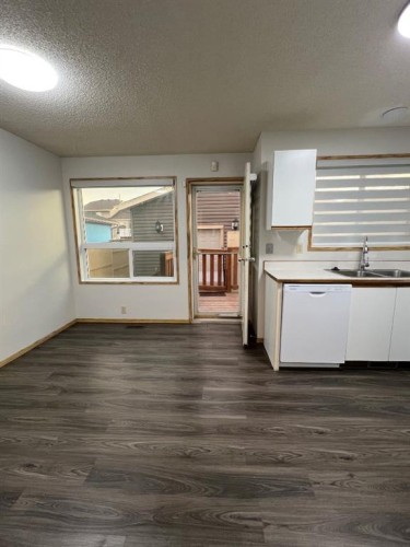 99 Martinwood Road Ne, Calgary, AB - Indoor Photo Showing Kitchen With Double Sink