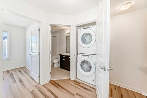 986 Sherwood Boulevard Nw, Calgary, AB - Indoor Photo Showing Laundry Room