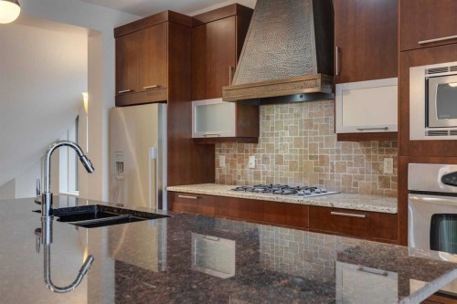 2005 32 Avenue Sw, Calgary, AB - Indoor Photo Showing Kitchen With Double Sink With Upgraded Kitchen