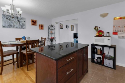 5122 48 Street Nw, Calgary, AB - Indoor Photo Showing Dining Room