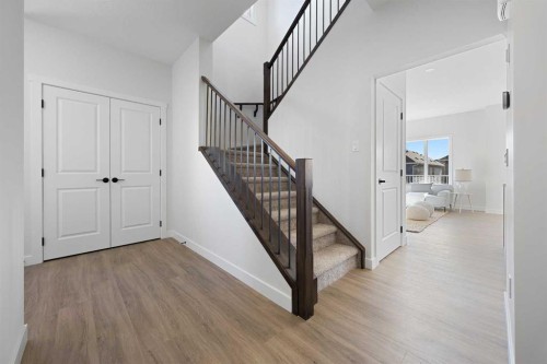 1398 Bayview Crescent Sw, Airdrie, AB - Indoor Photo Showing Other Room