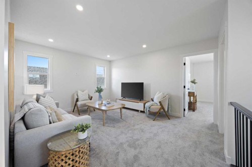 1398 Bayview Crescent Sw, Airdrie, AB - Indoor Photo Showing Living Room