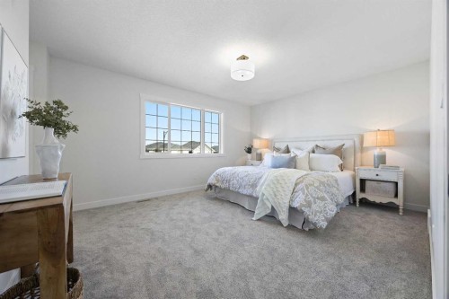 1398 Bayview Crescent Sw, Airdrie, AB - Indoor Photo Showing Bedroom