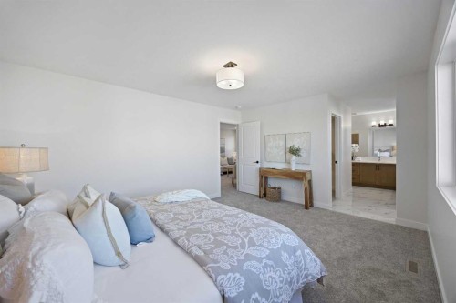1398 Bayview Crescent Sw, Airdrie, AB - Indoor Photo Showing Bedroom