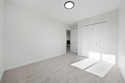 1398 Bayview Crescent Sw, Airdrie, AB - Indoor Photo Showing Other Room