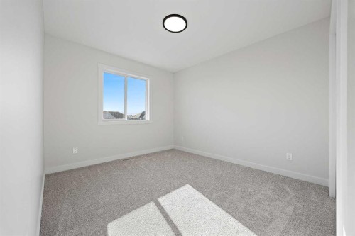 1398 Bayview Crescent Sw, Airdrie, AB - Indoor Photo Showing Other Room