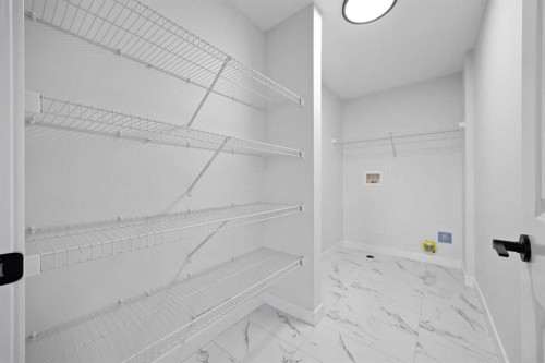 1398 Bayview Crescent Sw, Airdrie, AB - Indoor With Storage