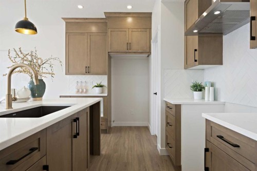 1398 Bayview Crescent Sw, Airdrie, AB - Indoor Photo Showing Kitchen