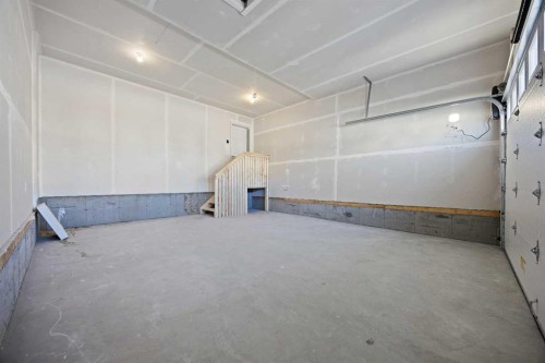 1398 Bayview Crescent Sw, Airdrie, AB - Indoor Photo Showing Garage
