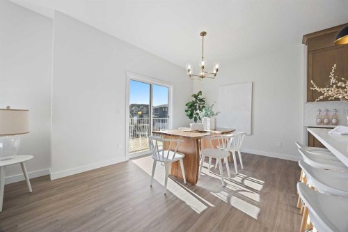 1398 Bayview Crescent Sw, Airdrie, AB - Indoor Photo Showing Dining Room