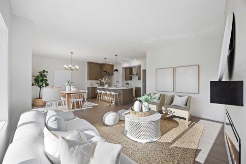 1398 Bayview Crescent Sw, Airdrie, AB - Indoor Photo Showing Living Room