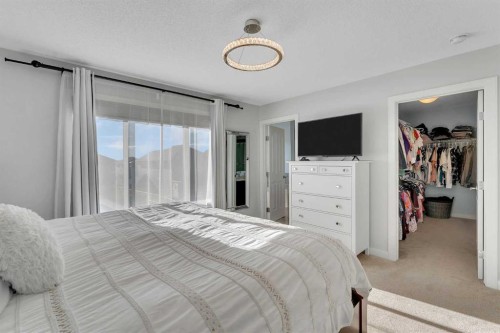 1535 Ravensmoor Way Se, Airdrie, AB - Indoor Photo Showing Bedroom